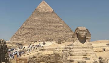 Great Sphinx of Giza with Pyramid in the background.