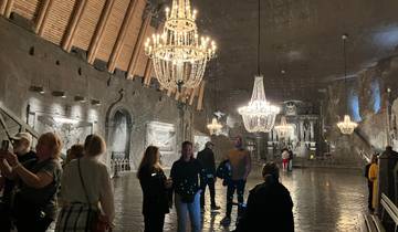 Underground hall with chandeliers inside a salt mine.