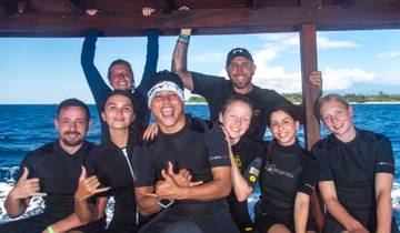 A group of people on a boat enjoying a day on the water.