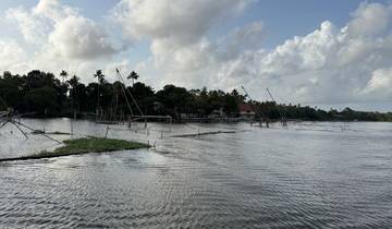 Backwater scene with fishing nets and cloudy sky.
