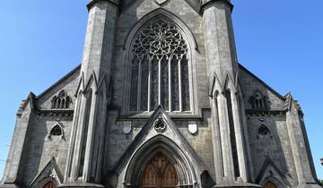 Grand church facade with detailed stone carvings.