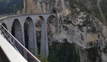 Impressive railway viaduct spanning a deep gorge.