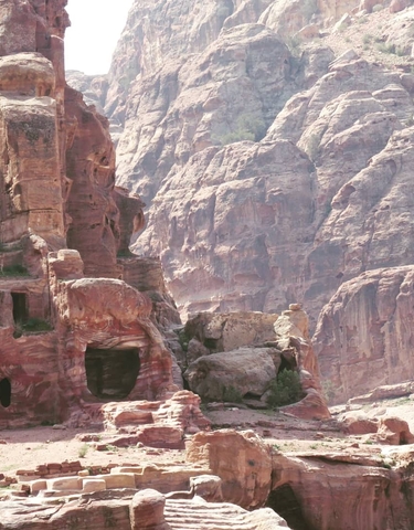 Canyon with red rock formations.