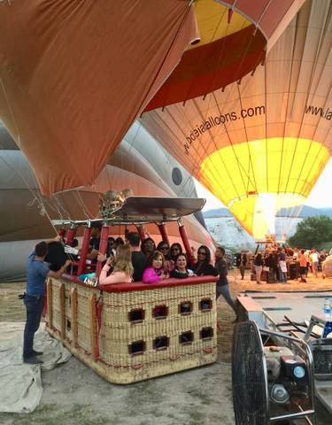 People preparing for a hot air balloon ride.