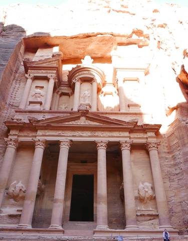 The famous Treasury of Petra with detailed architecture.