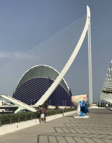 Modern architecture in City of Arts and Sciences with a clear blue sky.