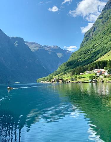 Fjord landscape with water and mountains.