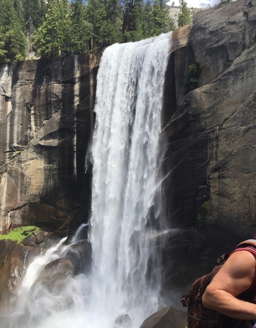 Majestic waterfall flowing down a rocky slope