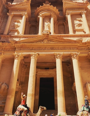 Facade of the ancient rock-carved Petra Treasury.
