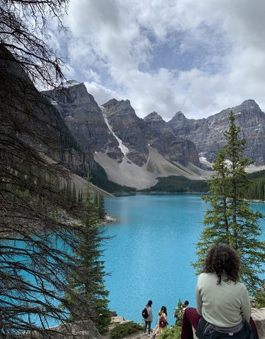 Turquoise lake surrounded by majestic mountains
