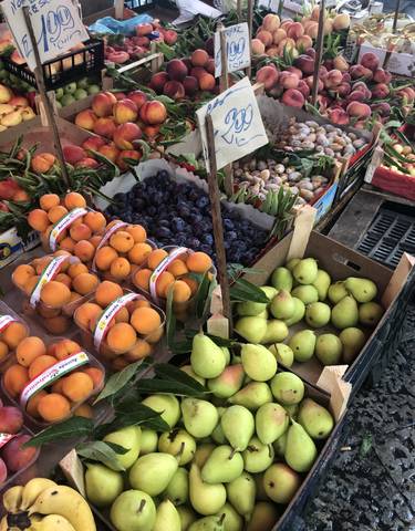 Fresh fruits displayed at a market.