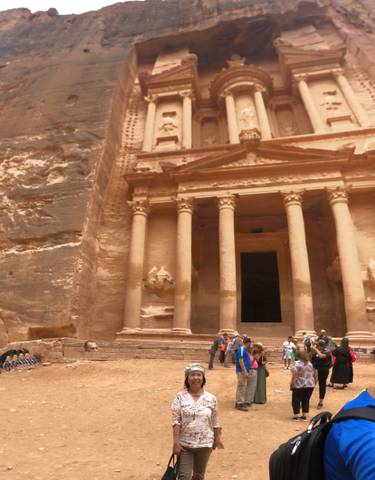 The Treasury at Petra with tourists admiring the site.
