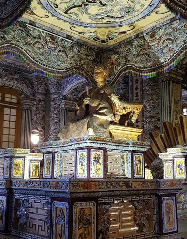 Intricate statues and decorations inside a historical building.