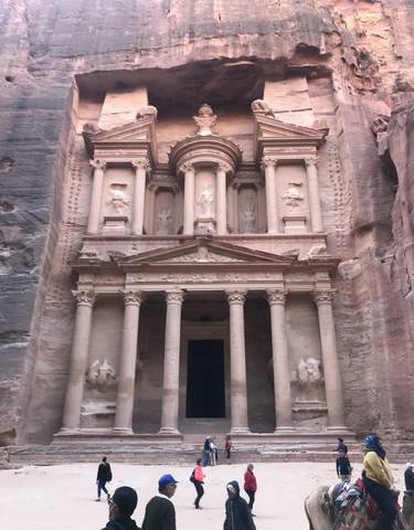 The Treasury at Petra carved into rose-red cliffs.