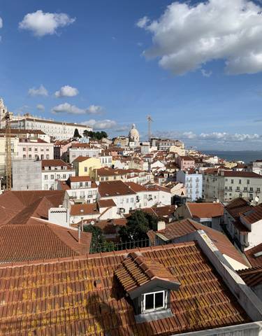 Panoramic view of Lisbon with a mix of colorful buildings