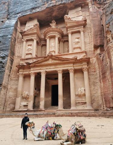 The famous Treasury at Petra carved into the rock.