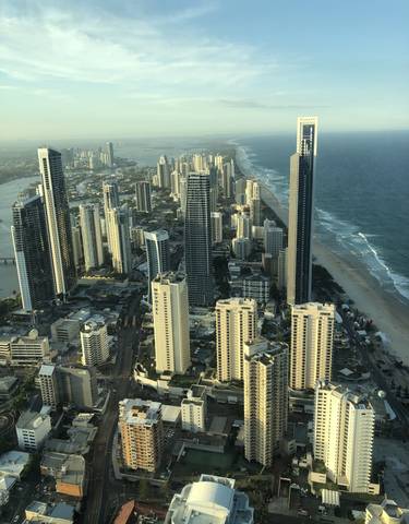 Skyline view of Surfers Paradise with high-rise buildings and coastline.