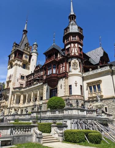Ornate castle with towers and detailed architecture.
