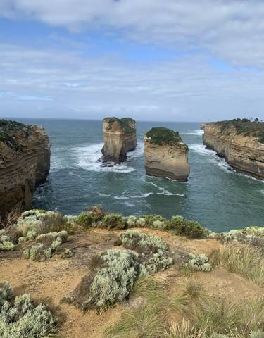 Beautiful coastal landscape with rock formations in the ocean.