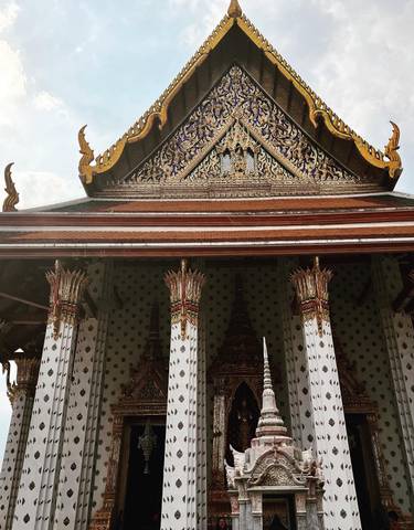 Ornate roof and columns of a Thai temple