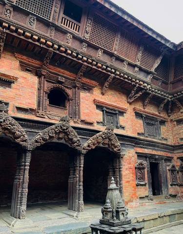 Intricate wooden carvings on a historic building.