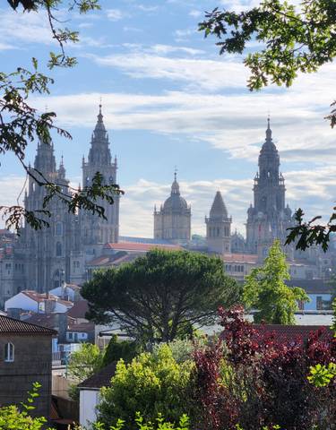 Skyline of Santiago de Compostela with prominent cathedral spires.