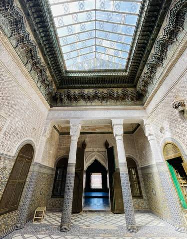 Traditional Moroccan interior architecture with intricate carvings.