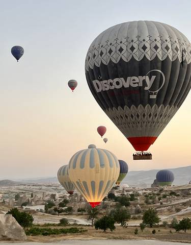 Close-up of hot air balloons flying.