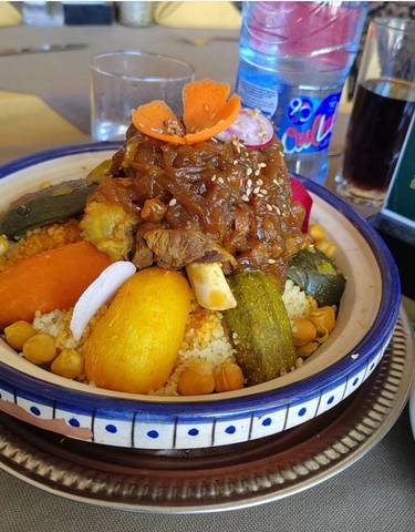 Traditional Moroccan couscous dish with vegetables.