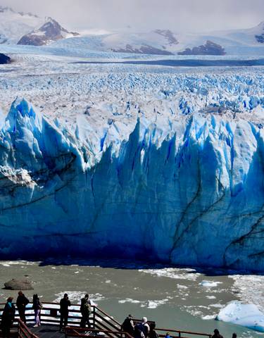 Close-up view of a glacier's icy surface.