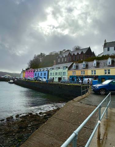 Colorful houses along a waterfront in Portree.