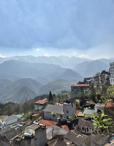 Mountain range with a town in the valley.
