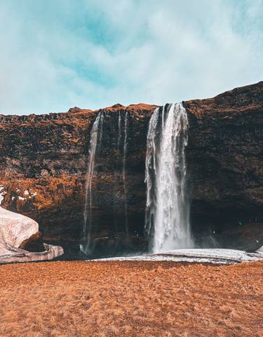 Waterfall cascading down a cliff.