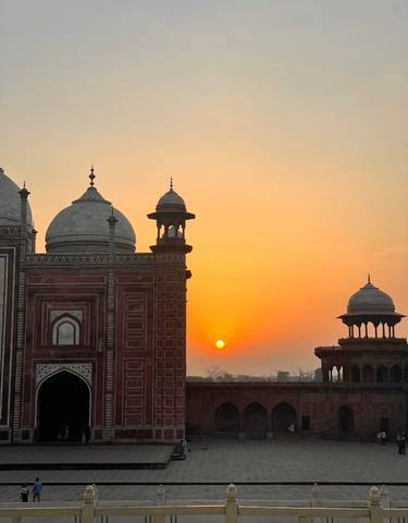 Sunset with silhouettes of architectural domes.