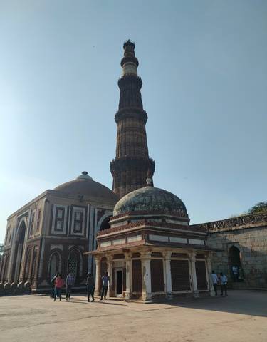 Tall historical tower with intricate designs.