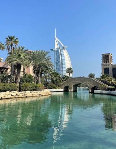 Luxurious urban hotel with famous architecture near water.