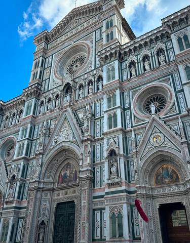 Detailed exterior of a cathedral with intricate carvings.