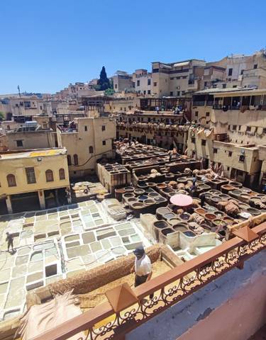 Historic tannery with vats in a medina.