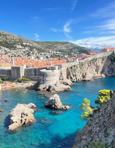 Stunning view of Dubrovnik's historic city walls and coastline.