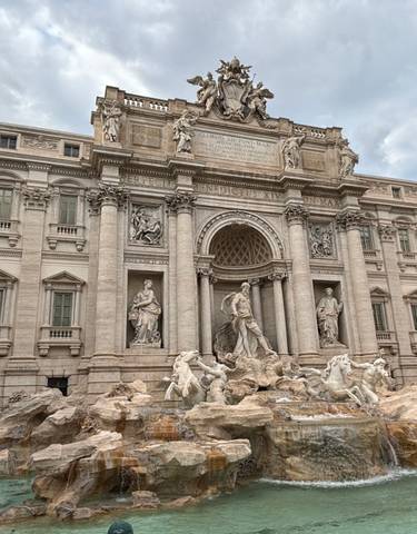 Fontana di Trevi in Rome with intricate sculptures.