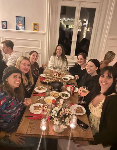 Group of people enjoying a meal together.