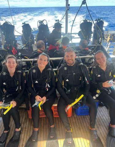 Scuba divers posing for a photo.