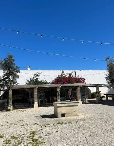 Sailboats at sunset over a calm sea in Boracay.
