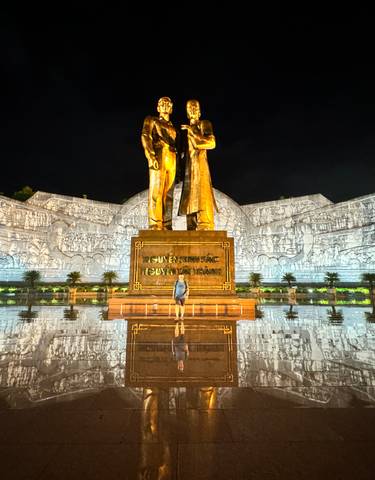Huge monument with a reflective floor at night