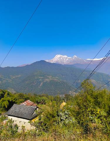 Mountainous landscape with snow-capped peaks.