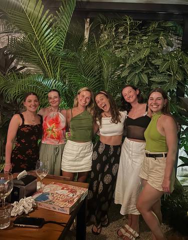 Group of friends dressed up for an evening.