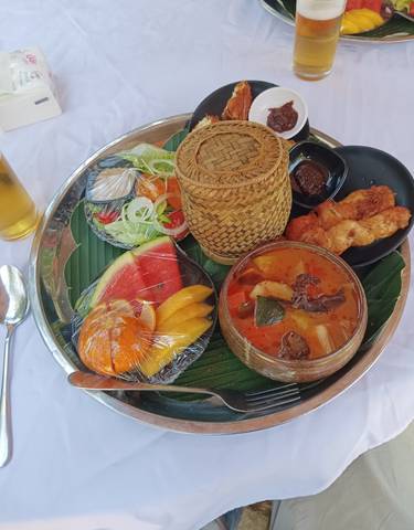 A colorful plate of traditional Laotian food.