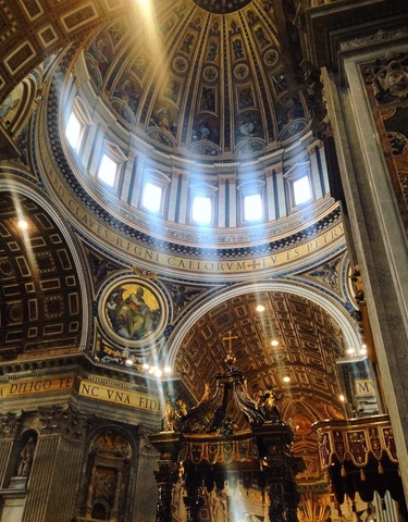 Elaborately decorated ceiling of St. Peter's Basilica.