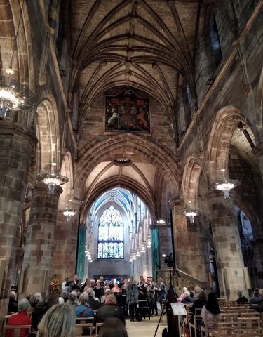 Elaborate stone interior of a historic religious building.