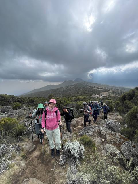 Group of hikers on a mountain trail.